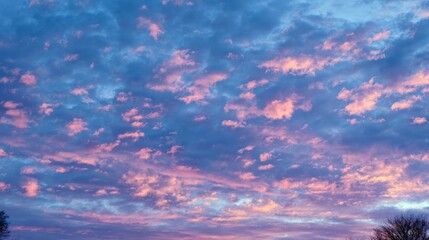 Colorful Sunrise Sky with Clouds and Vibrant Pink and Blue Hues