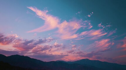 Vibrant Sunset with Colorful Clouds Over Mountain Landscape