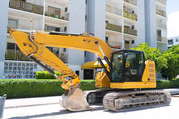 Repair with heavy machinery excavator. Construction site and industrial heavy machine excavator. Excavator digger. Heavy equipment machinery. Industrial heavy equipment