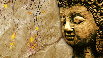 Decorative close-up of golden Buddha face on luxury textured wall design.