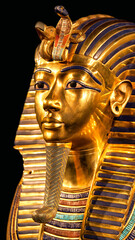 Golden funerary mask of pharaoh Tutankhamun with vivid blue inlays and cobra vulture emblems on...