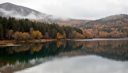 Serene Autumn Landscape with Calm Lake and Colorful Foliage Reflections