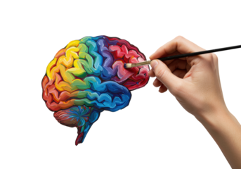 Isolated human brain being painted rainbow colors by an artist's hand with a brush
