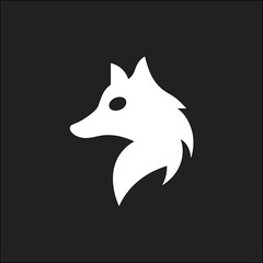 Wild jackal, fox, wolf, dog vector symbol on black background, perfect for safari branding and tribal style graphics.