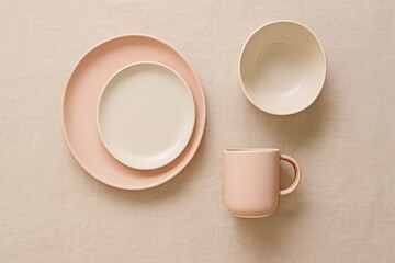 Elegant pastel tableware arrangement perfect for lifestyle or dining-related editorial use.
