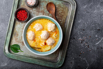 Soup with meatballs, potatoes and cheese top view. Meatballs in thick vegetable soup Albondigas. Mexican and Spanish, European and Russian cuisine