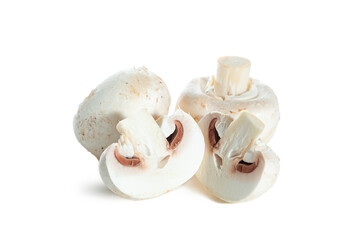 Whole and sliced ​​champignons isolated on white background.