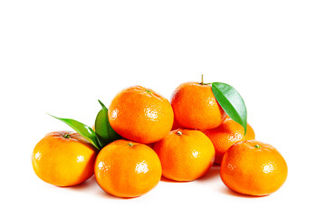 Juicy shiny tangerines with leaves isolated on white background.