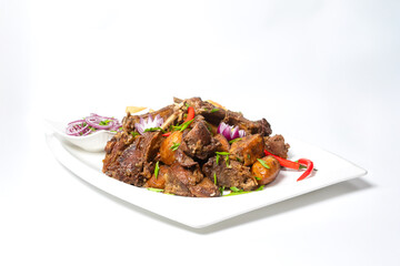Traditional meat dish with flatbread and onion top view