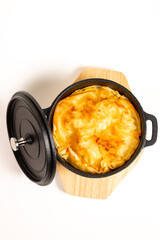 Casserole in Cast Iron top View on White background