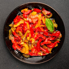 Roasted pepper salad vegetables dish natural product tasty snack fresh delicious gourmet food background on the table rustic top view copy space keto and paleo diet vegan and vegan food