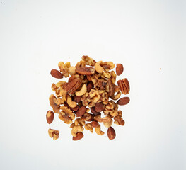Assorted mixed nuts pile with almonds cashews walnuts and pecans