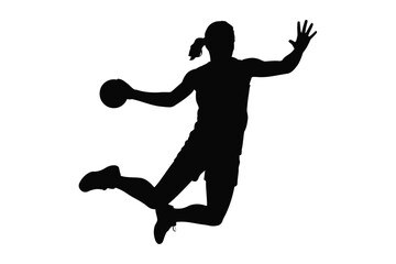 Silhouette of a handball player in mid air during a game