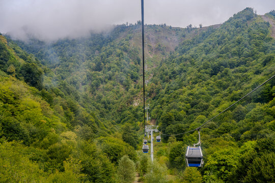 Cable cars in forested mountains Qabala
