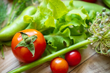 Autumn fresh vegetables on wooden table background