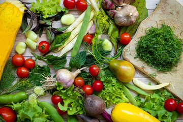 Autumn fresh vegetables on wooden table background