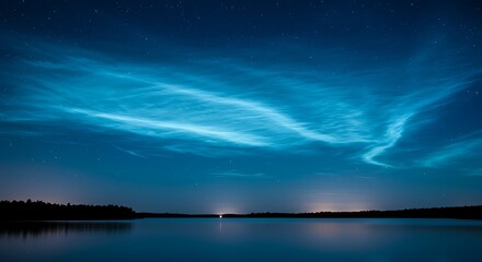 Noctilucent clouds over still water at night natures atmospheric display