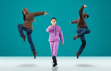 Young funny lady dance wear sport suit dancing on  background
