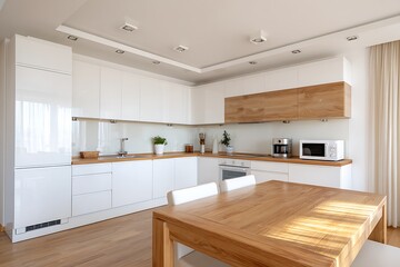A bright and spacious modern kitchen with white cabinets, wooden countertops, and a dining area, creating a clean and inviting home interior.