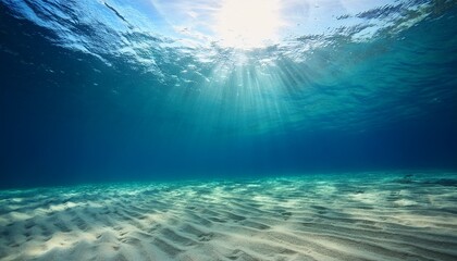 Fototapeta premium Tranquil Underwater Seascape With Sunlight Rays And Sandy Ocean Floor