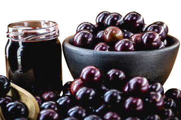 Jaboticaba or jabuticaba is a purplish black-white fruit that can be eaten raw or used to make jams, juices, liqueur or wine. Typical Brazil fruit on white isolated background.