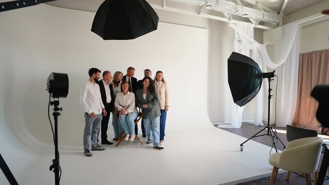 Professional photographer taking picture of a business team