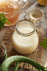 Homemade shampoo made with flax seed gel, argan oil, apple cider vinegar, nettle and coco glucoside. Alternative haircare.