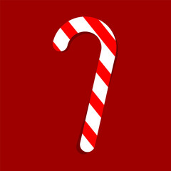 Simple Christmas sweet red and white sugar cane flat lay on dark red background
