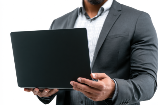 A man in a suit holding a laptop, isolated on a white background.