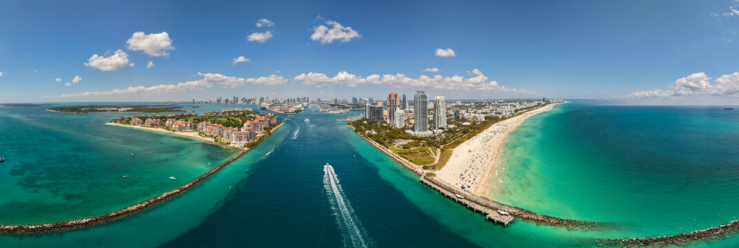 Panorama of Miami skyline and Biscayne Bay. Panoramic cityscape with coastal skyscrapers.
