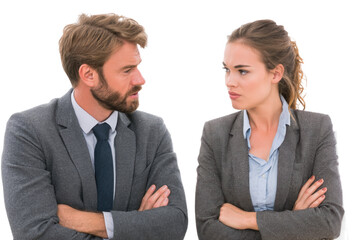 Two business professionals, a man and a woman, are in a tense disagreement, with crossed arms.