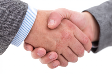 Close-up of a firm handshake between two businesspeople in formal suits, symbolizing an agreement or partnership.