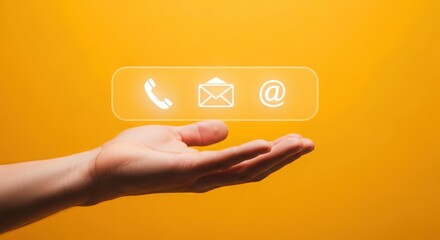 Contact information icons floating above a hand against a yellow background