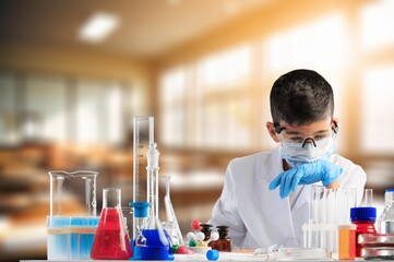 Little child make chemistry science experimental chemistry lessons.