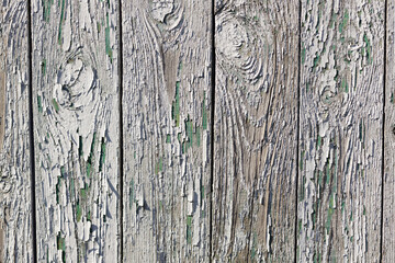 Weathered wooden planks showing age and character in rustic setting