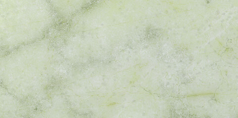 Subtle green marble texture background with delicate veining, creating a soft and elegant surface for various design applications and artistic projects