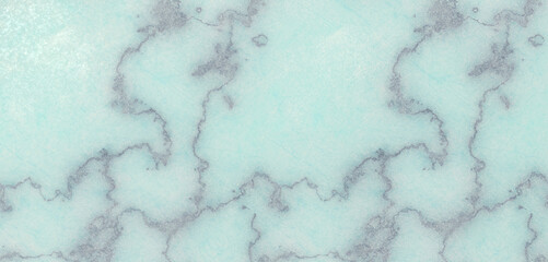 Elegant light turquoise marble texture with silver veins, creating a luxurious and sophisticated backdrop for various design projects and artistic endeavors