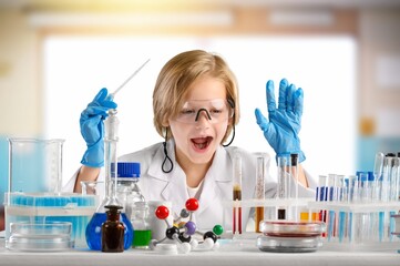 Little child make chemistry science experimental chemistry lessons.