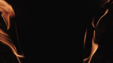 Burning paper, glowing edge of paper on a black background. Mockup for your logo. Wide angle horizontal wallpaper or web banner. flame effects for overlay designs or screen blending mode to make high. - Powered by Adobe