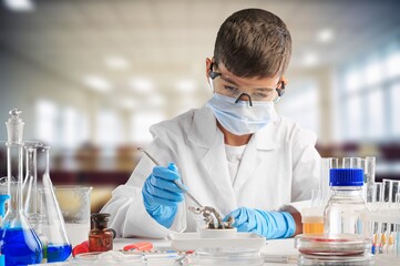 Little child make chemistry science experimental chemistry lessons.