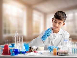 Little child make chemistry science experimental chemistry lessons.