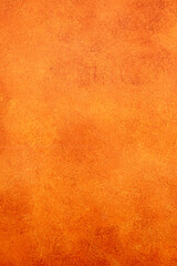 Orange background presenting a grunge texture with color gradient