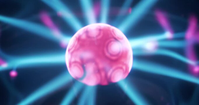 Plasma globe with noble gas inside and with filaments extending from inner sphere to outer. Electromagnetic interactions are responsible for glowing filaments. Also works as an ionizer, close-up video