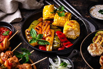 Assortment of grilled bbq meat and vegetables