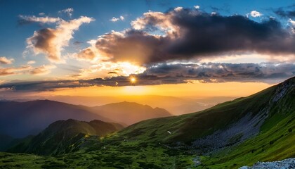 Sunset In The Mountains With Cloudy Background