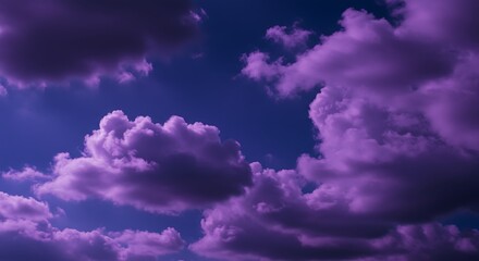 Dramatic purple clouds in a vibrant blue sky during daytime