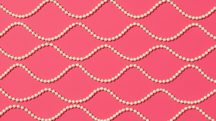 A repeating pattern of pearl necklaces in a wavy formation on a pink background. This elegant and feminine design is perfect for beauty, fashion, or wedding-themed backgrounds.