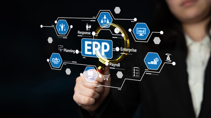 A business professional examines the concept of ERP using a magnifying glass, emphasizing the...