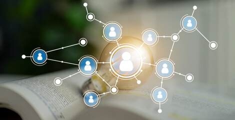 This image illustrates the concept of networking and connections in the digital age, featuring icons of people interconnected over an open book background, symbolizing knowledge sharing. Crux