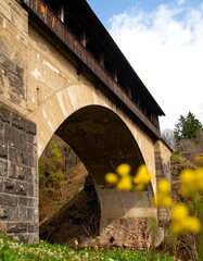 Stone arch bridge over valley